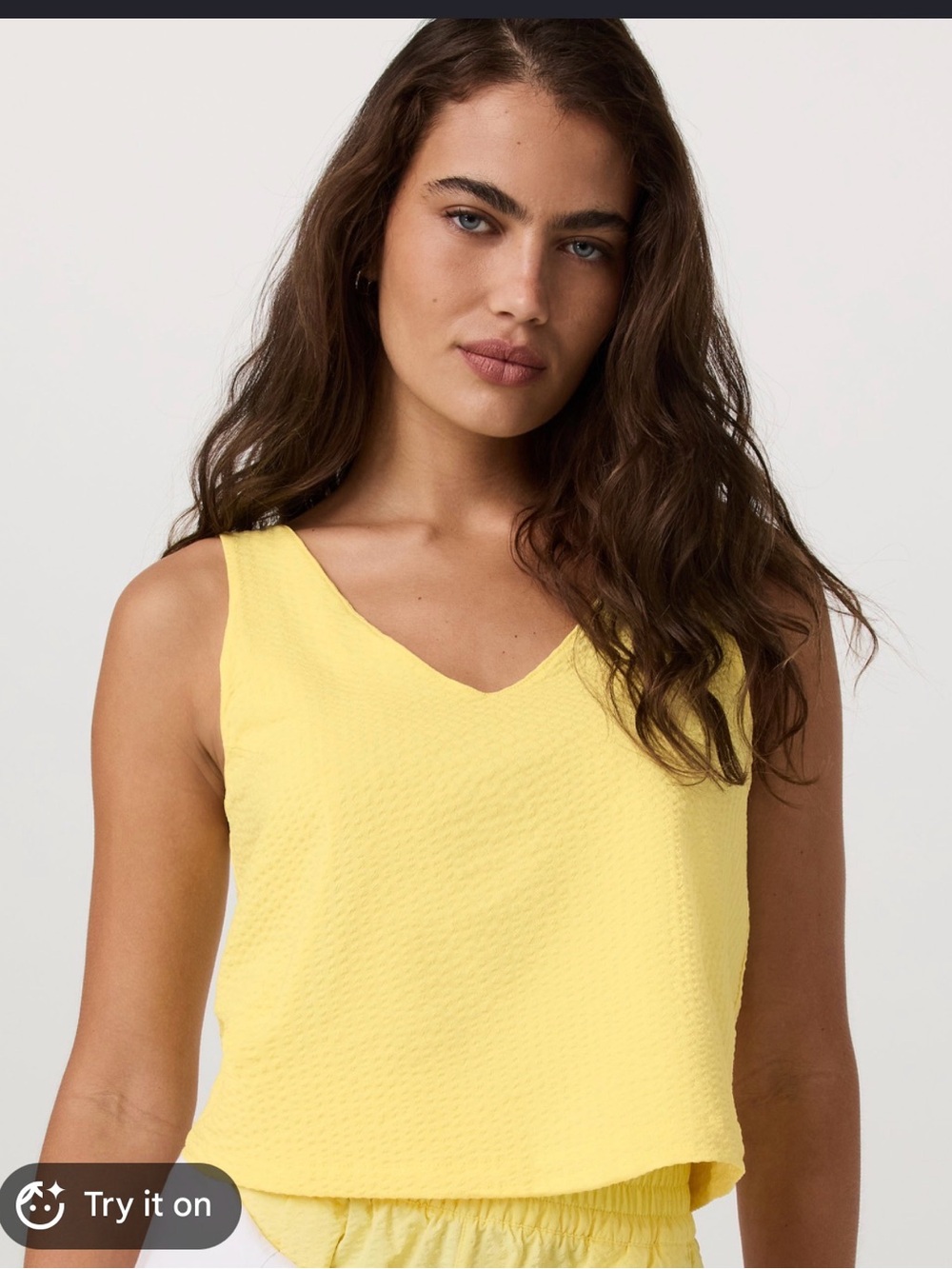 15. Vuori Villa textured crop tank in sunlight
